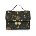 Vintage moth mushroom floral satchel bag front view — dark green canvas with butterfly and botanical print
