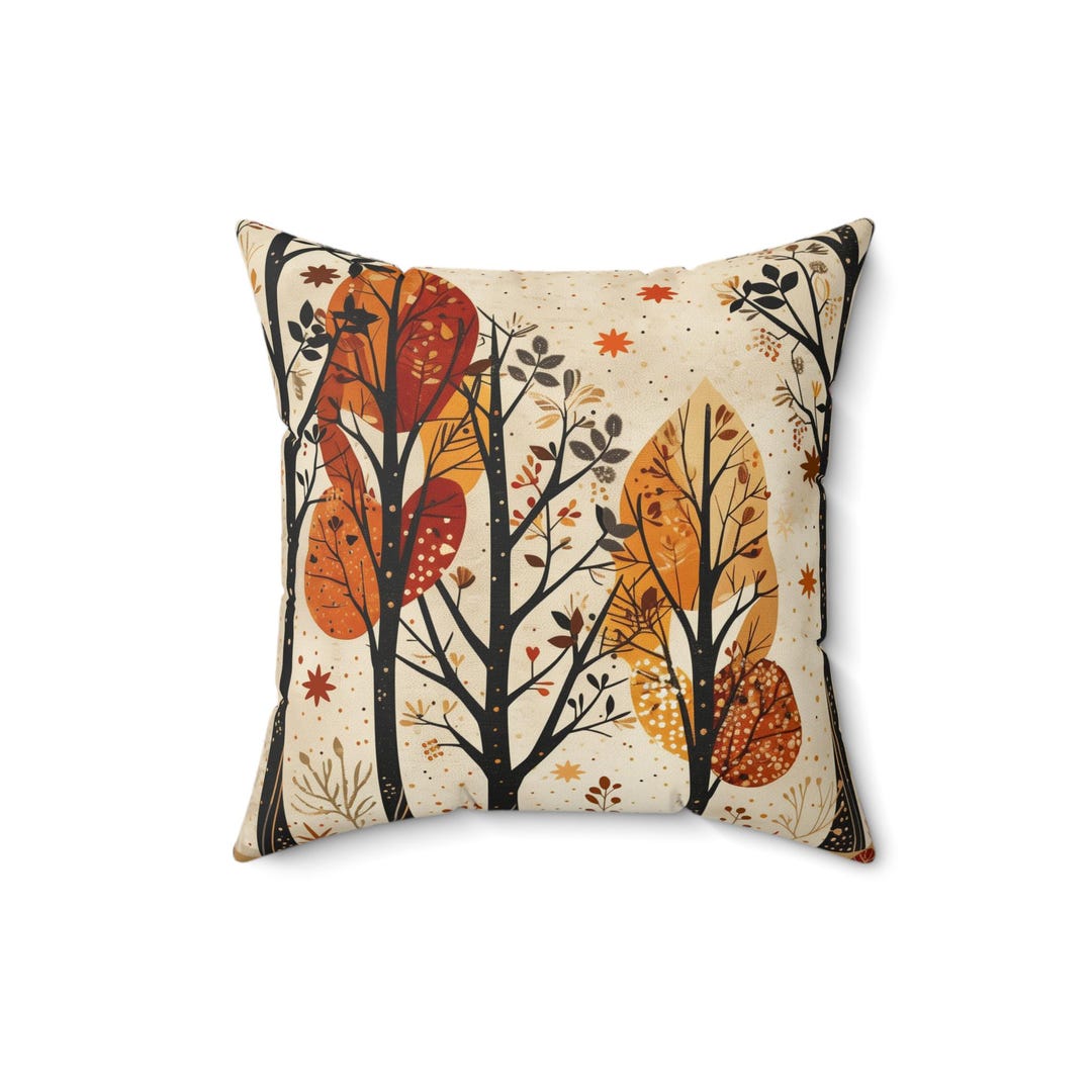 Autumn tree illustration pillow in a cozy living room