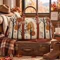 Autumn forest duffle bag with orange fall leaves and woodland trees, waterproof weekender travel bag