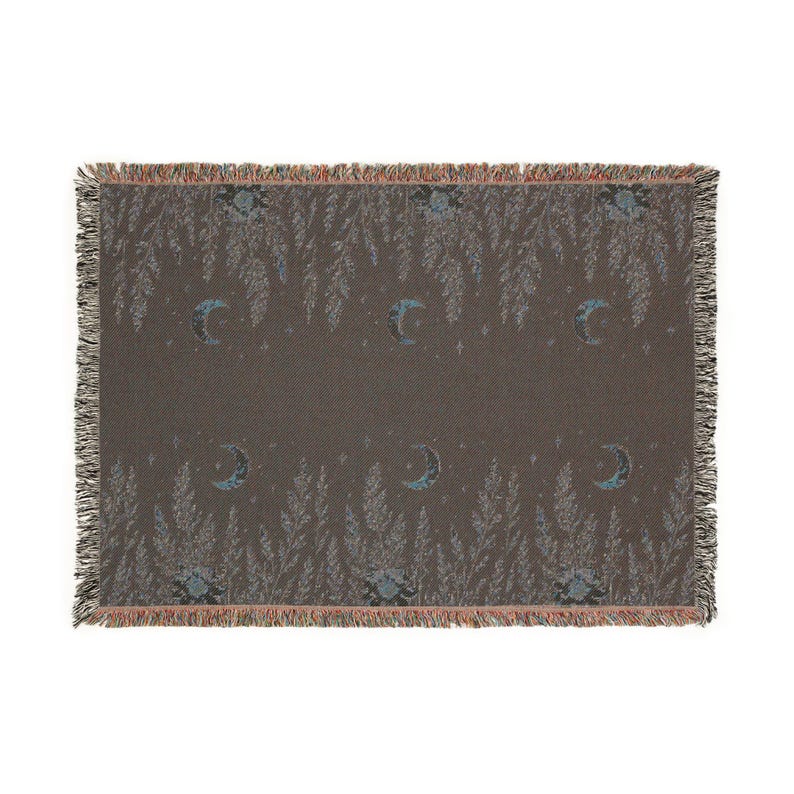 Back of the crescent celestial botanical woven blanket, three sizes