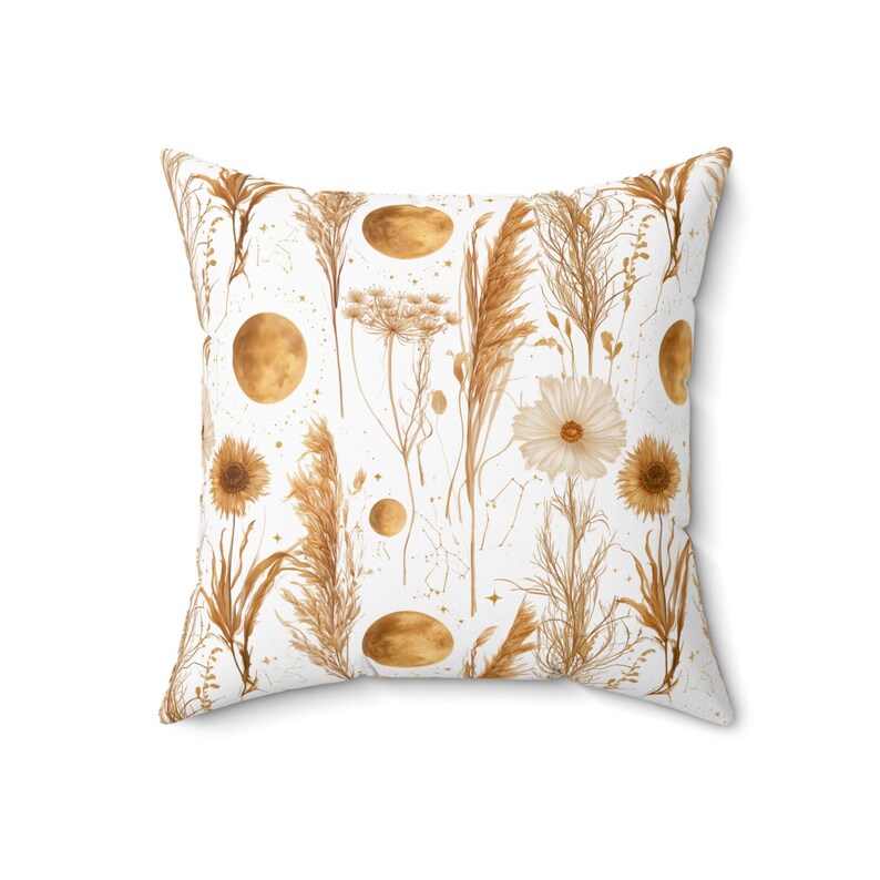 Corner detail of golden wildflower and moon pattern pillow showing concealed zipper