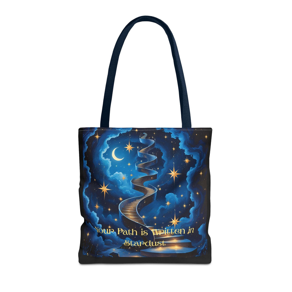 Cosmic Stardust Tote Bag flat lay — deep blue celestial design with gold stars, crescent moon, winding stardust path, and "Your Path is Written in Stardust" script, black handle