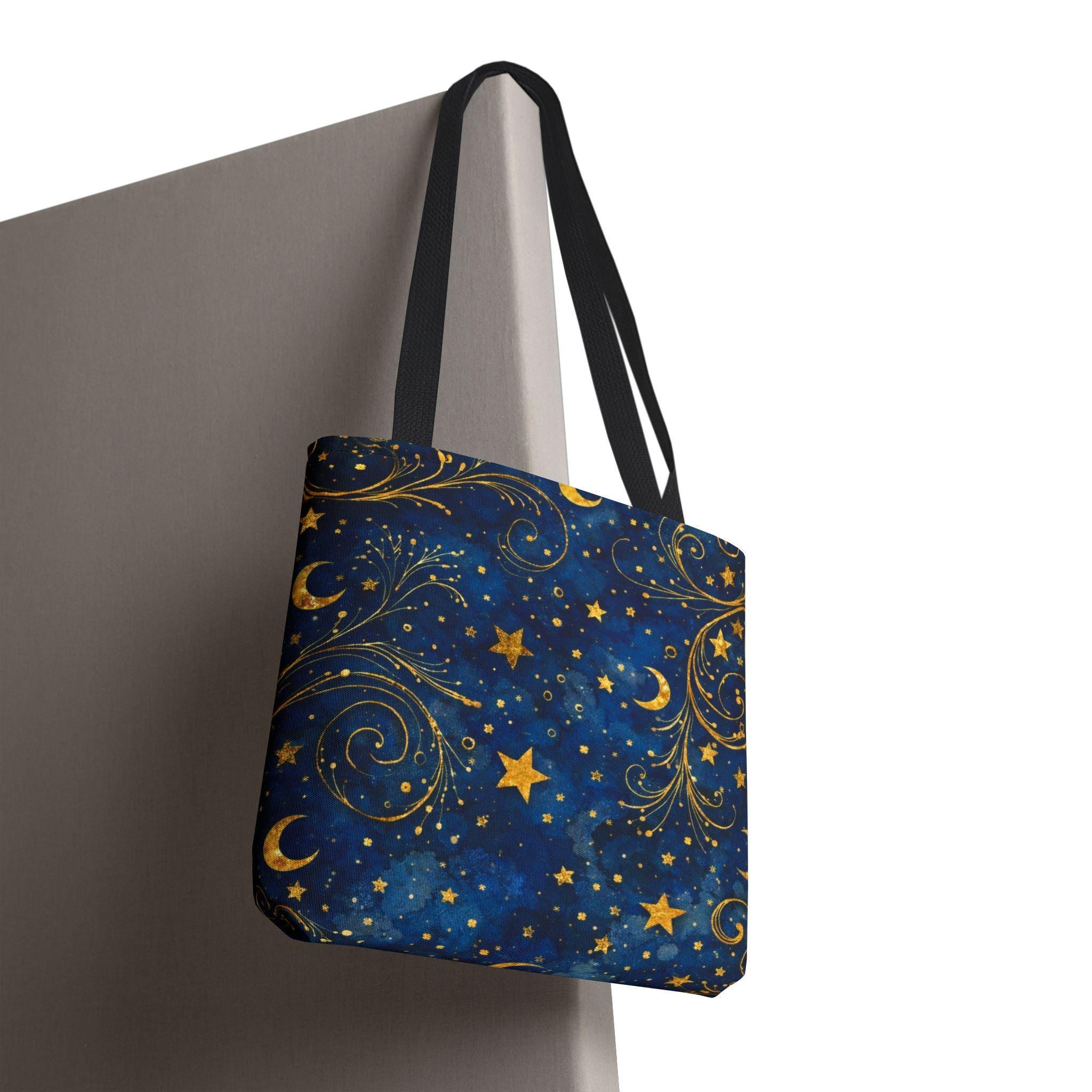 Celestial Navy Blue Tote Bag with black handle — gold stars and crescent moon pattern on canvas
