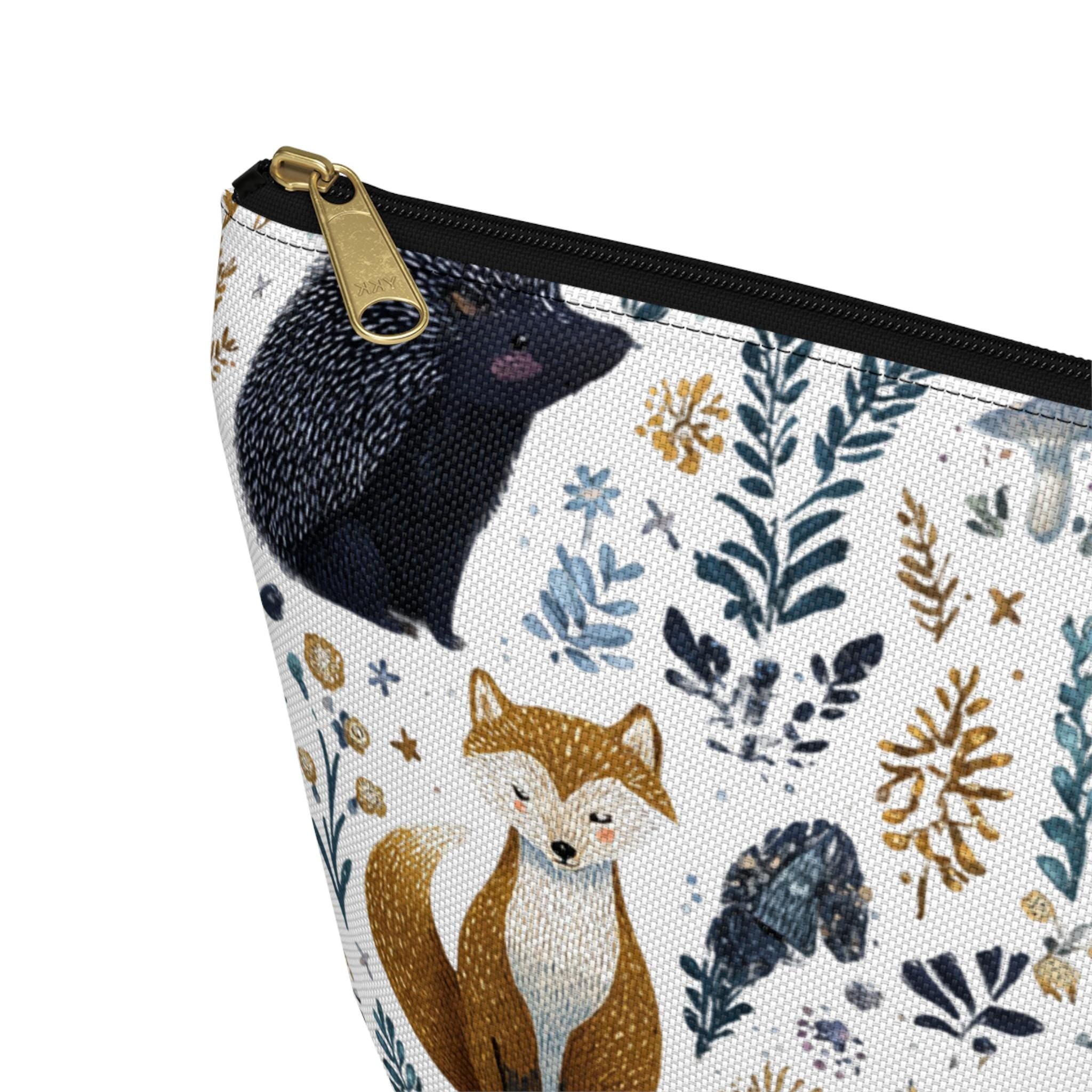 Pouch with fox design and floral patterns on a white background