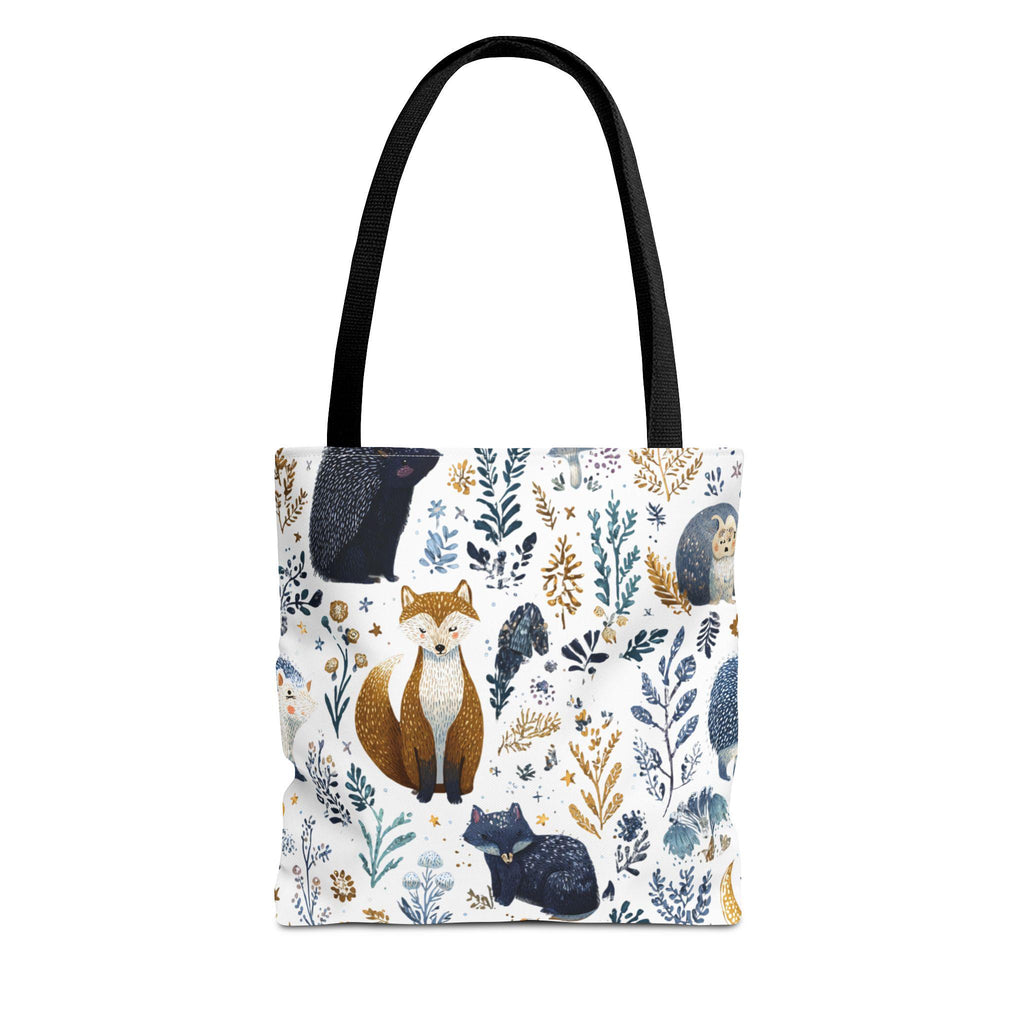 Woodland Fox and Hedgehog Tote Bag flat lay — forest animal print with foxes, hedgehogs, and floral sprigs in navy, amber, and gray, black handle
