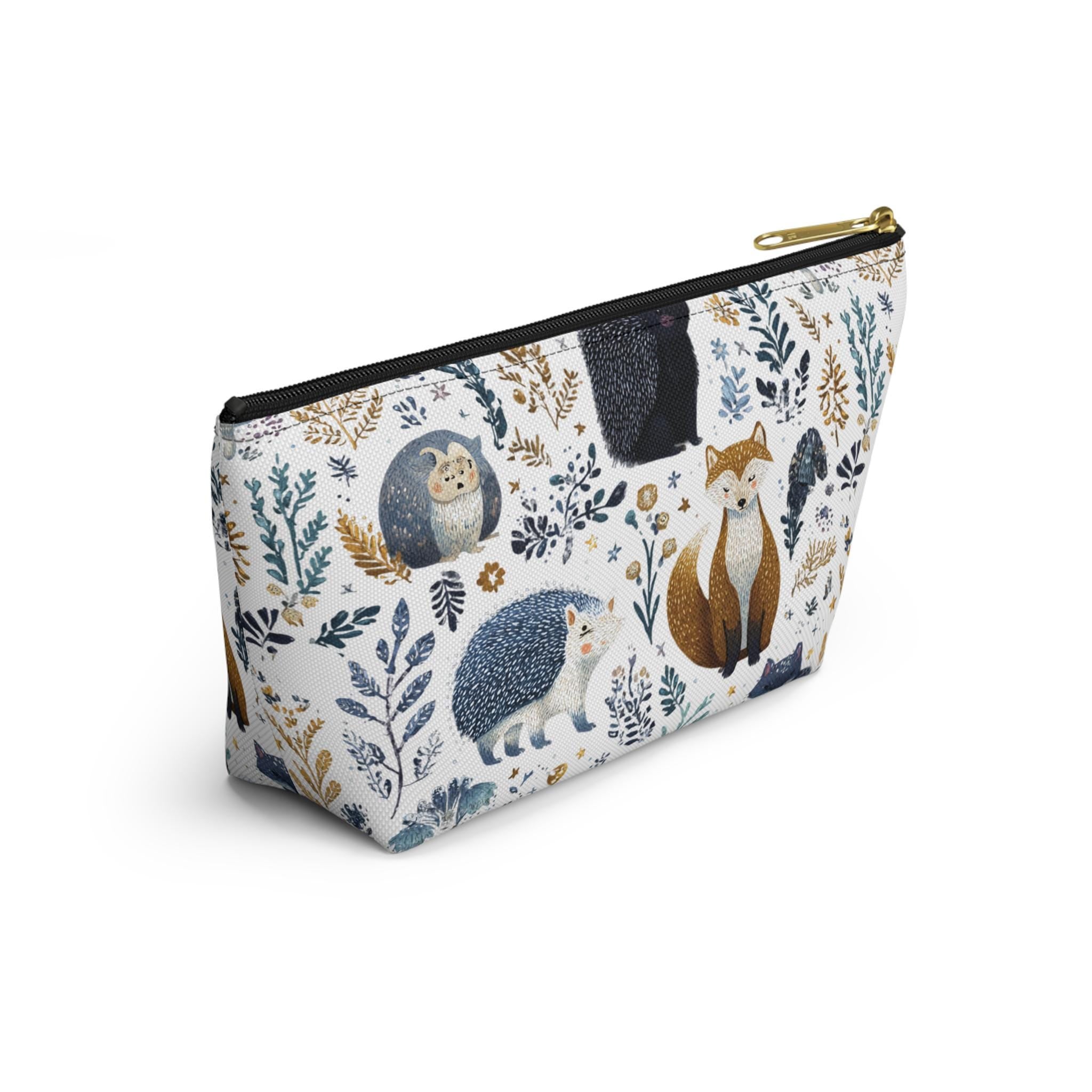 Cosmetic bag with animal and nature pattern on a white background