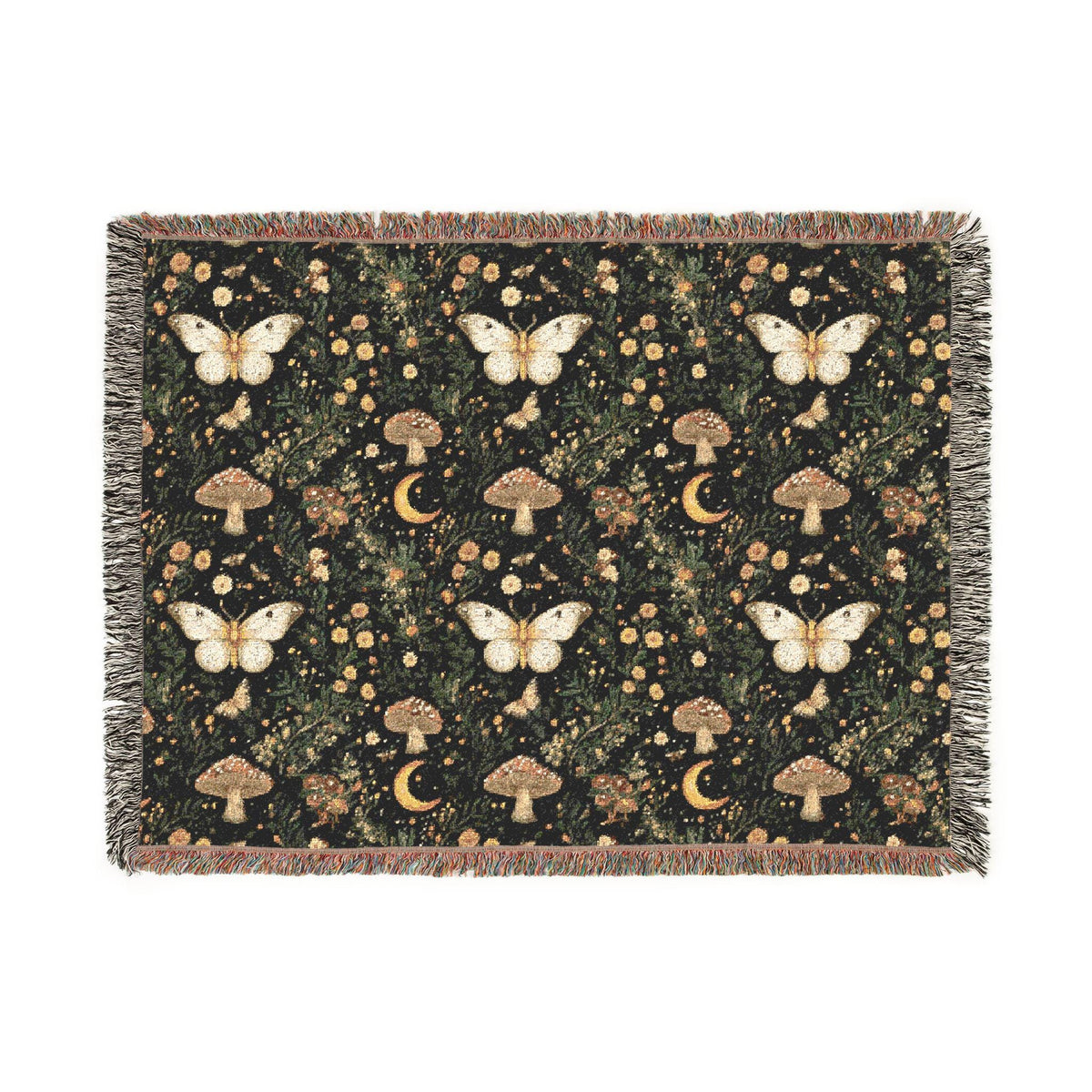 A rectangular woven throw blanket with fringe edges, featuring a dark forest pattern with cream butterflies, brown mushrooms, and gold crescent moons on a black background.