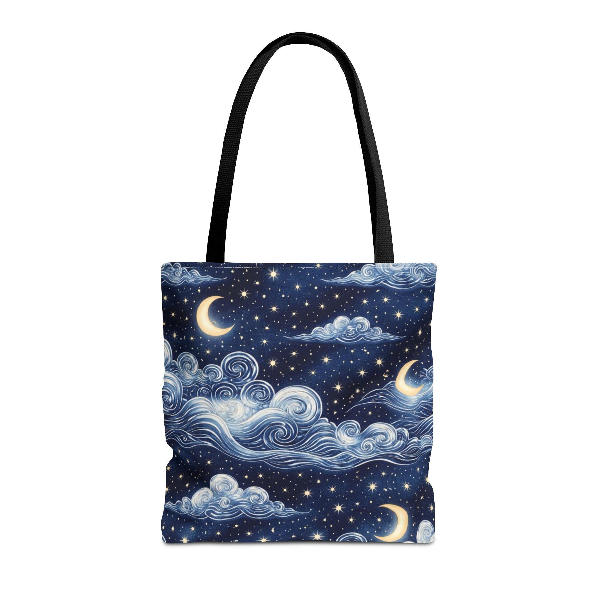 Moon and whimsical clouds tote bag front view — navy blue night sky tote with swirling clouds stars and dual crescent moons
