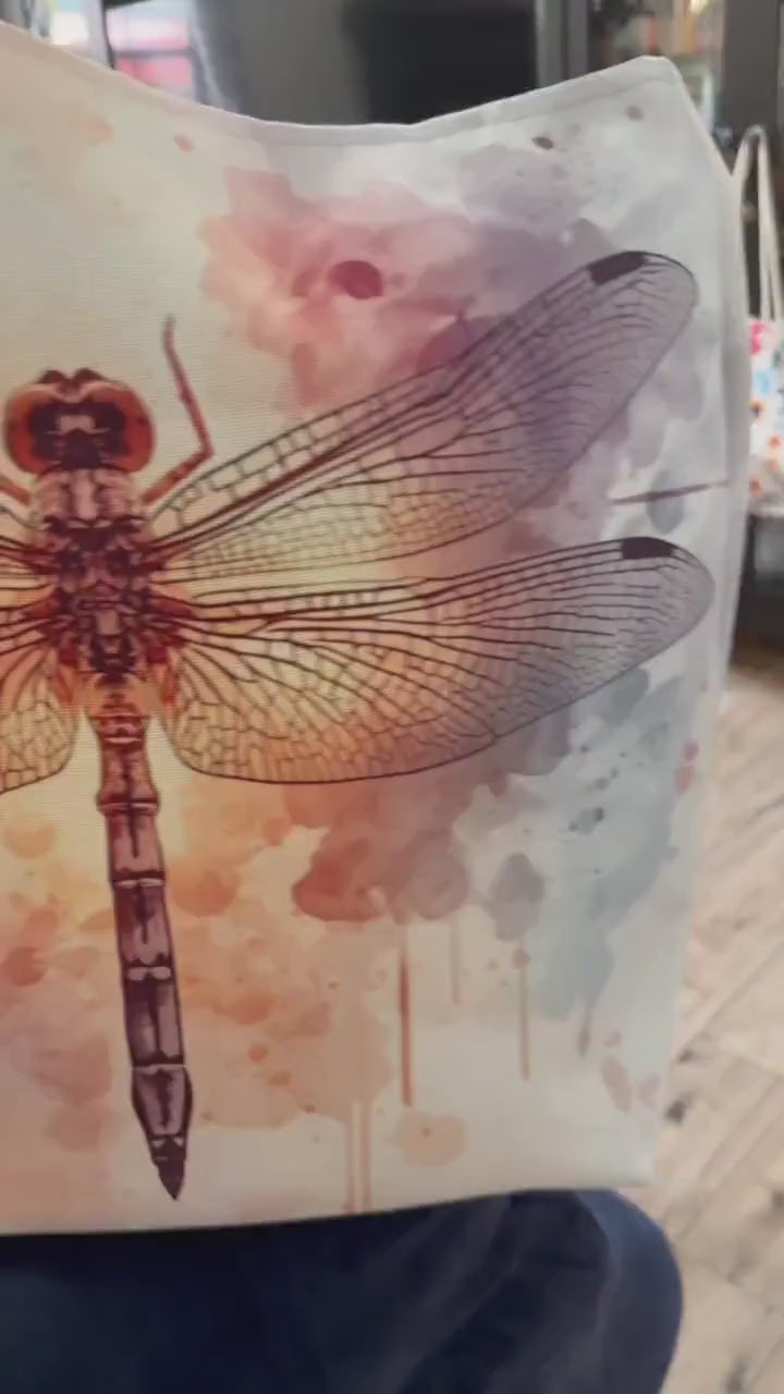 Watercolor Dragonfly Tote Bag close-up video — vintage dragonfly illustration on soft watercolor wash background in cream, blush, and sage tones